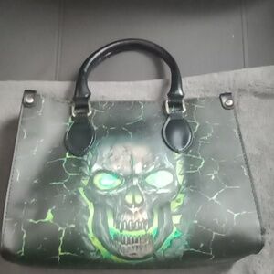 Green skull bag.